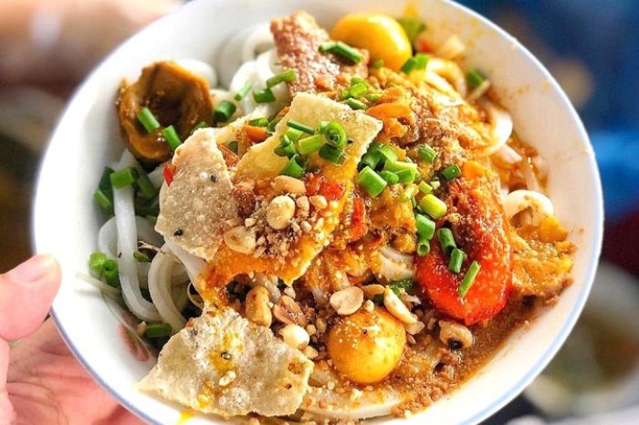 Mi Quang turmeric noodle dish from Hoi An Vietnam
