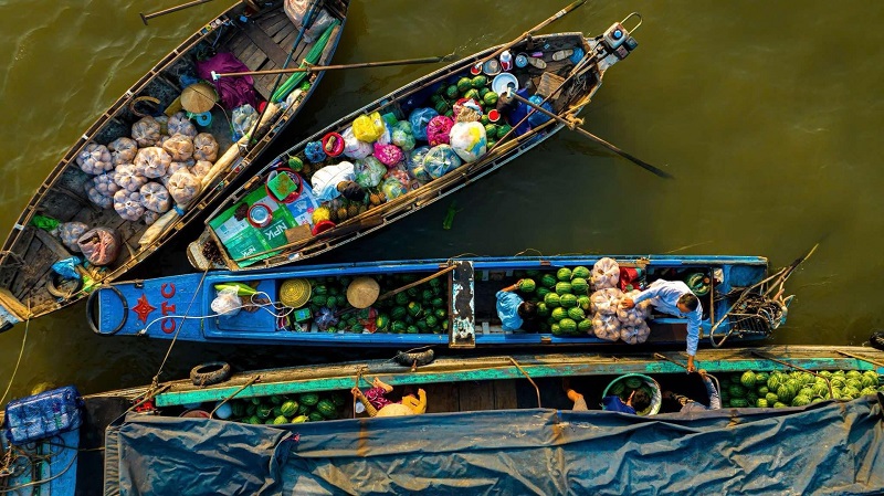 Traditional riverside scene featuring dishes in the Mekong Delta