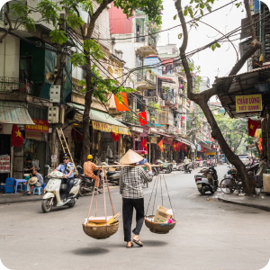 Hanoi Old Quarter street with vendors and traditional daily life
