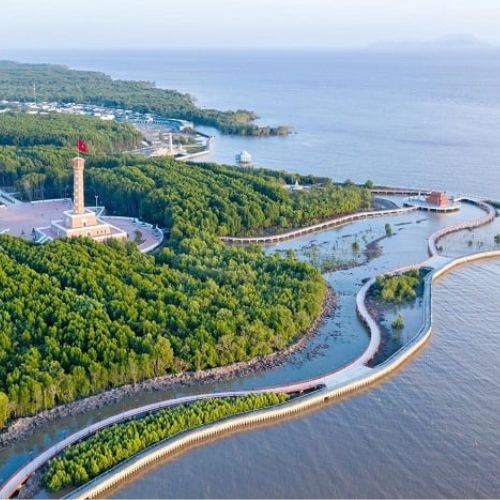 Boats and riverside villages in the Mekong Delta, Vietnam.