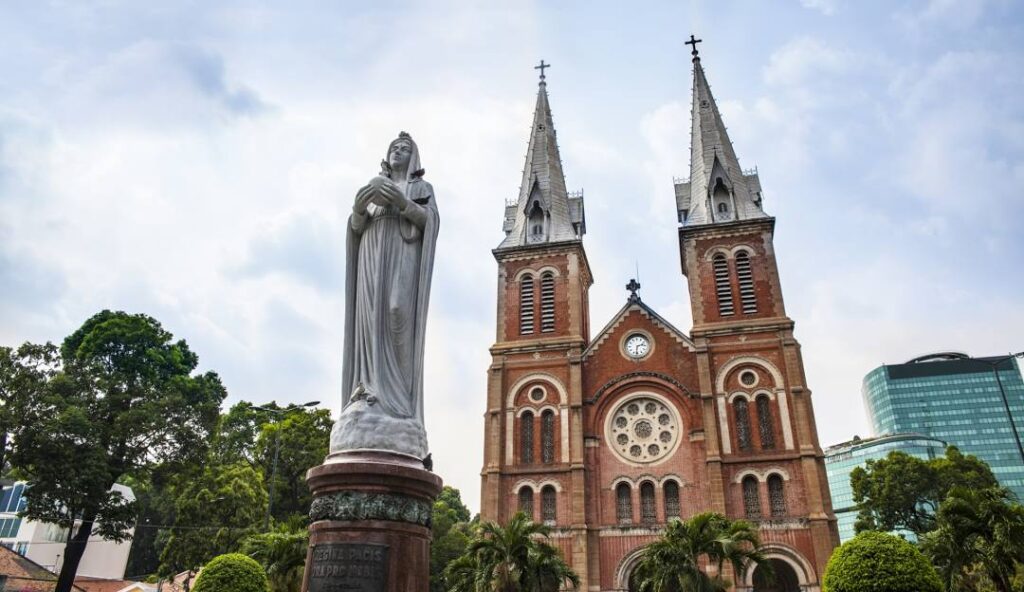 Notre-Dame Cathedral Basilica of Saigon with the Virgin Mary statue in Ho Chi Minh City