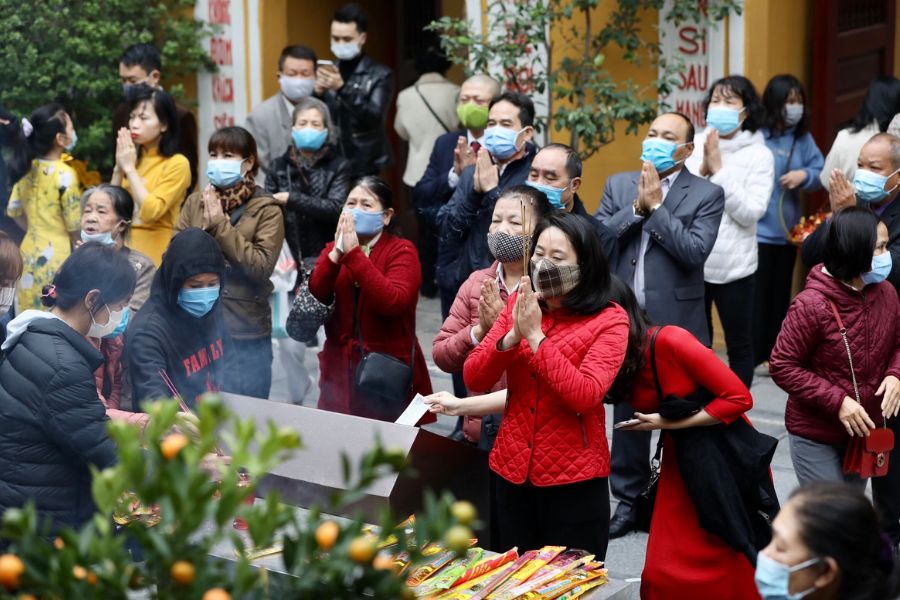 People visiting a temple during Vietnam Lunar New Year