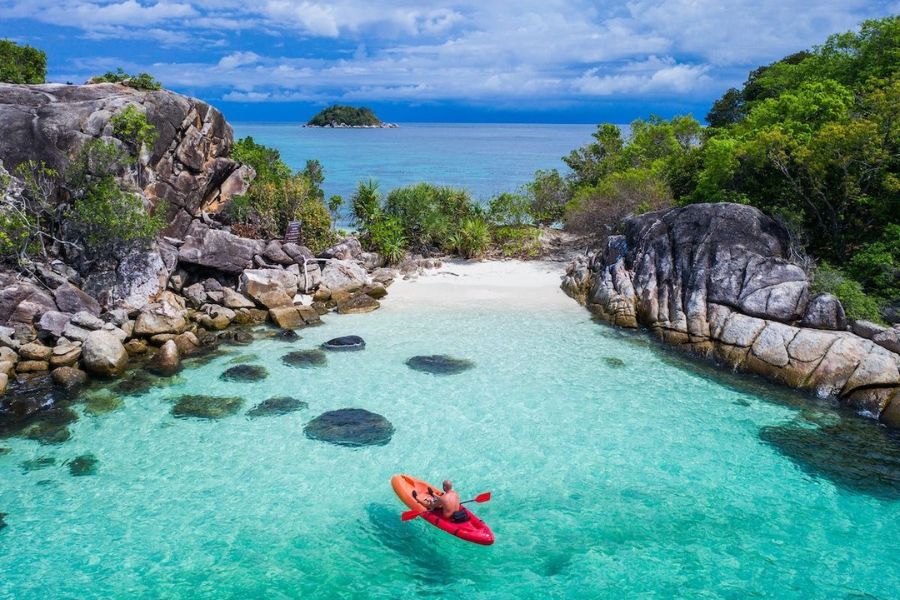 Tropical island beach in Thailand with clear water