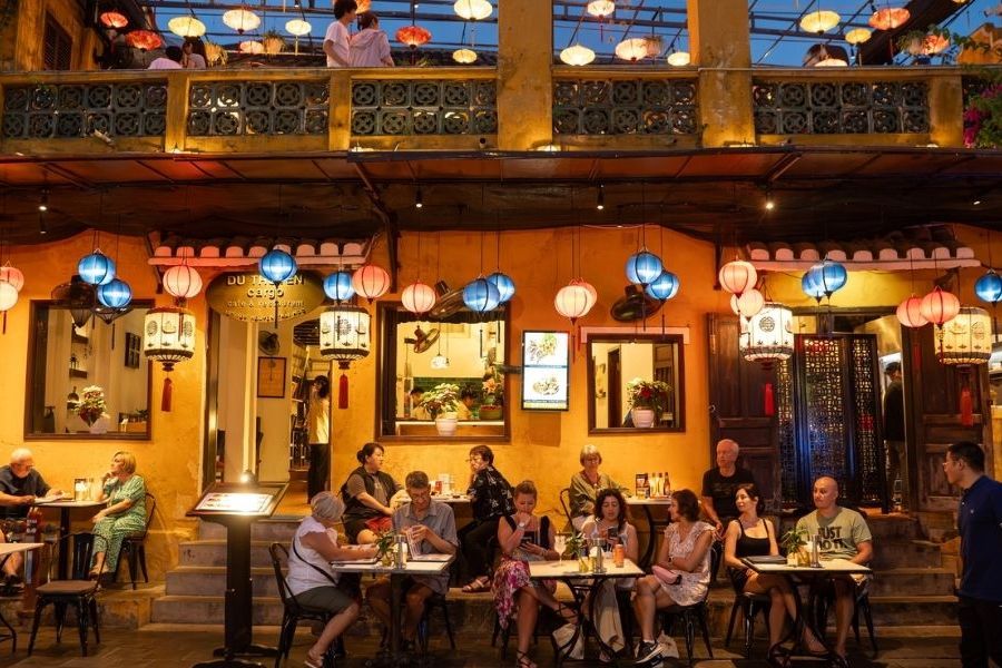 Traveler enjoying a peaceful café experience during slow travel in Vietnam