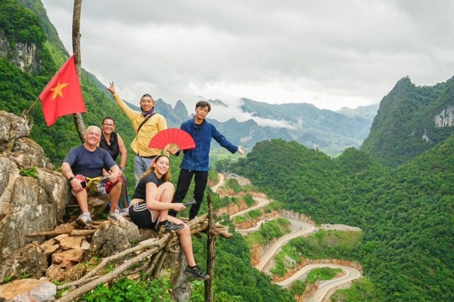Traveler enjoying a viewpoint on the Ha Giang Loop