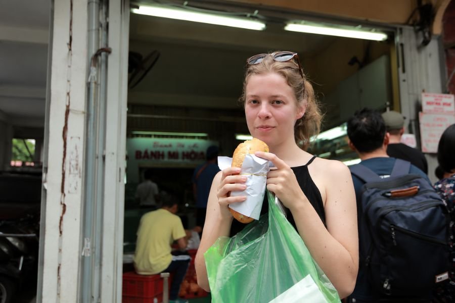 Solo traveler enjoying Vietnamese street food