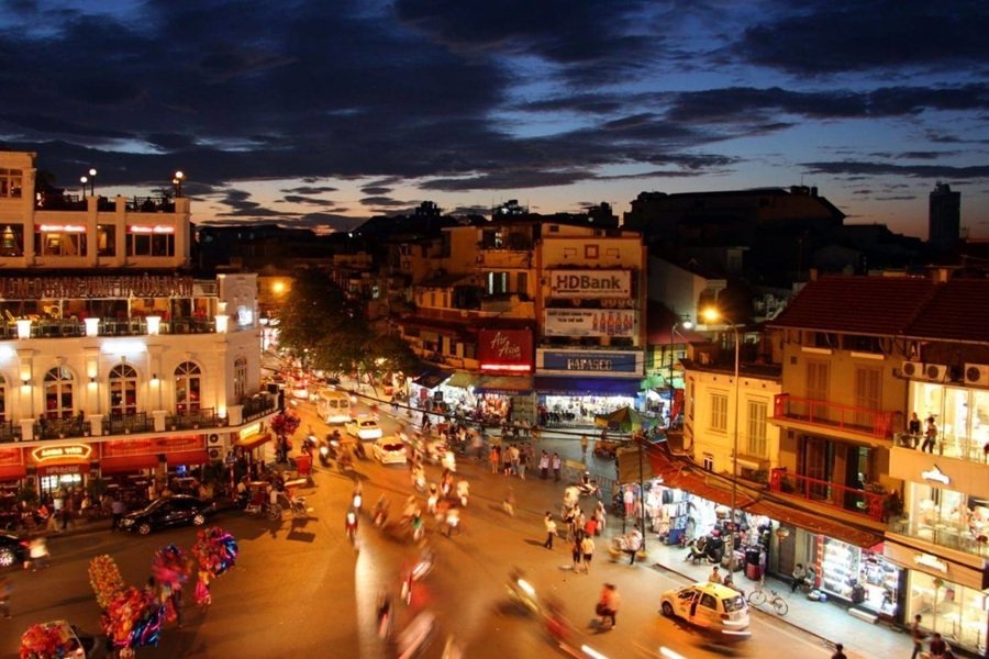 Hanoi Old Quarter at night with lively street life