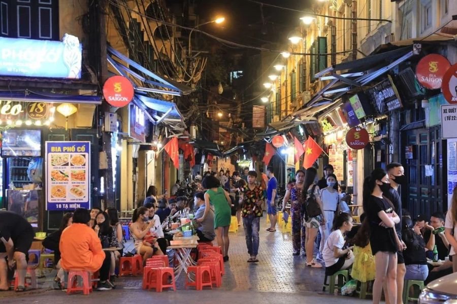 LGBTQ couple exploring Hanoi Old Quarter