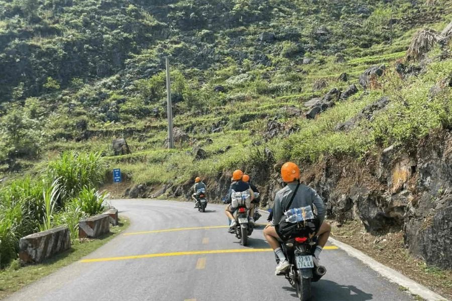 Travelers exploring the Ha Giang Loop by motorbike