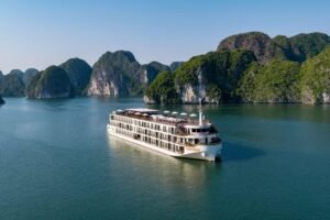 Ha Long Bay Cruise Safety – Cruise ship sailing among limestone islands